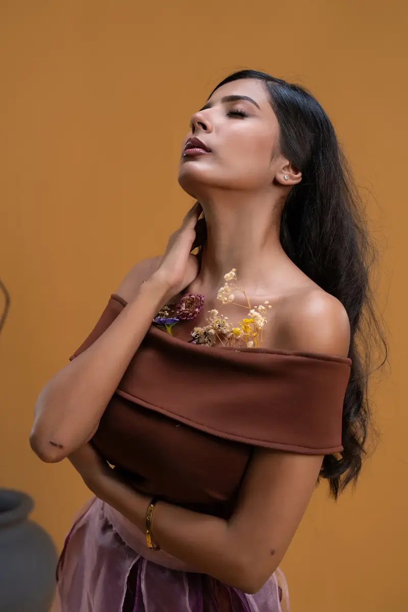 Petal Remains BUFT Graduation Couture Collection 2026 by Bangladeshi fashion designer Narin Juhi — layered organza in dusty rose, violet, cocoa and ivory with ruffles and dried-flower embroidery, photo 4 of 36