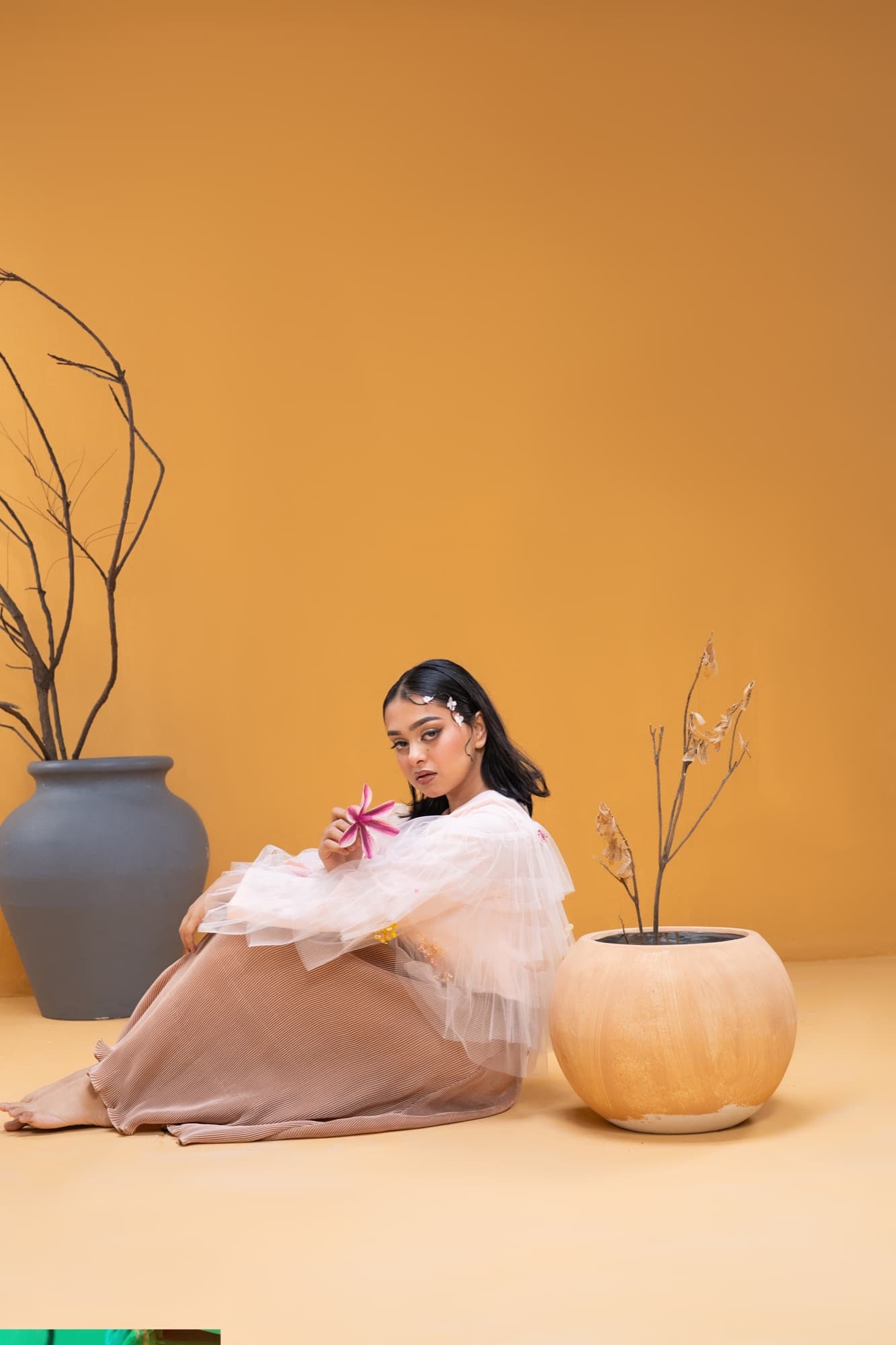 Petal Remains BUFT Graduation Couture Collection 2026 by Bangladeshi fashion designer Narin Juhi — layered organza in dusty rose, violet, cocoa and ivory with ruffles and dried-flower embroidery, photo 30 of 36