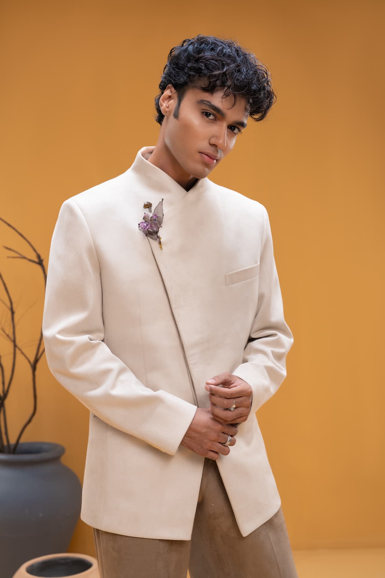 Petal Remains BUFT Graduation Couture Collection 2026 by Bangladeshi fashion designer Narin Juhi — layered organza in dusty rose, violet, cocoa and ivory with ruffles and dried-flower embroidery, photo 21 of 36