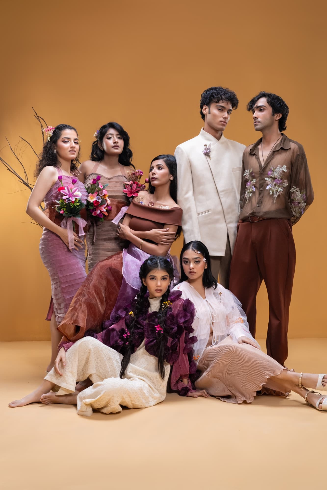 Petal Remains BUFT Graduation Couture Collection 2026 by Bangladeshi fashion designer Narin Juhi — layered organza in dusty rose, violet, cocoa and ivory with ruffles and dried-flower embroidery, photo 16 of 36