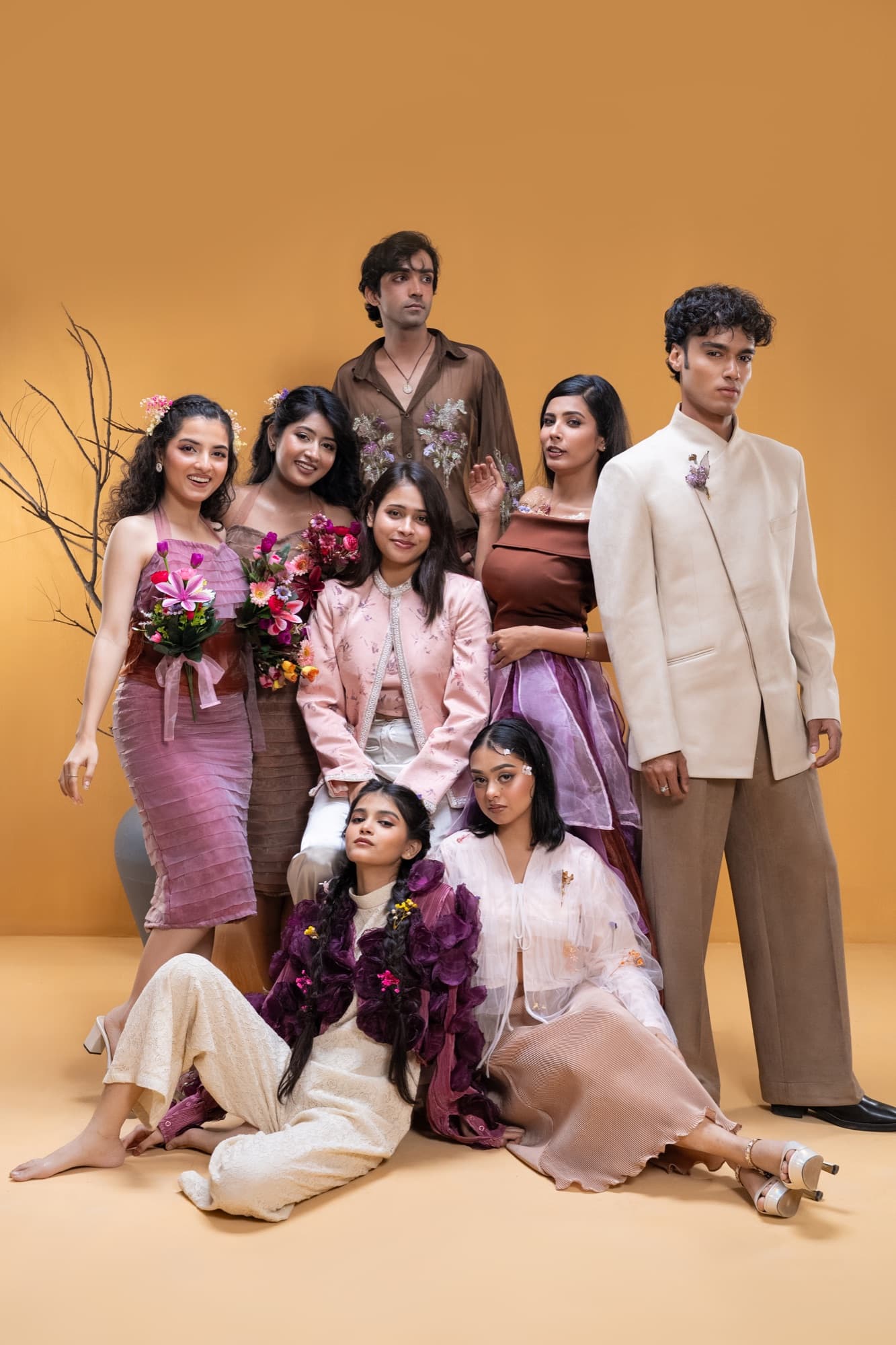 Petal Remains BUFT Graduation Couture Collection 2026 by Bangladeshi fashion designer Narin Juhi — layered organza in dusty rose, violet, cocoa and ivory with ruffles and dried-flower embroidery, photo 14 of 36