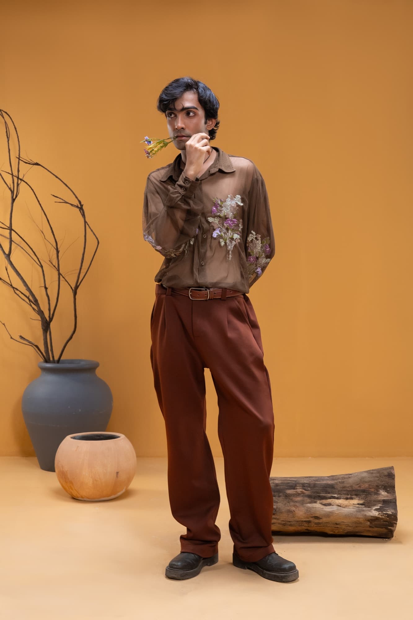 Petal Remains BUFT Graduation Couture Collection 2026 by Bangladeshi fashion designer Narin Juhi — layered organza in dusty rose, violet, cocoa and ivory with ruffles and dried-flower embroidery, photo 10 of 36