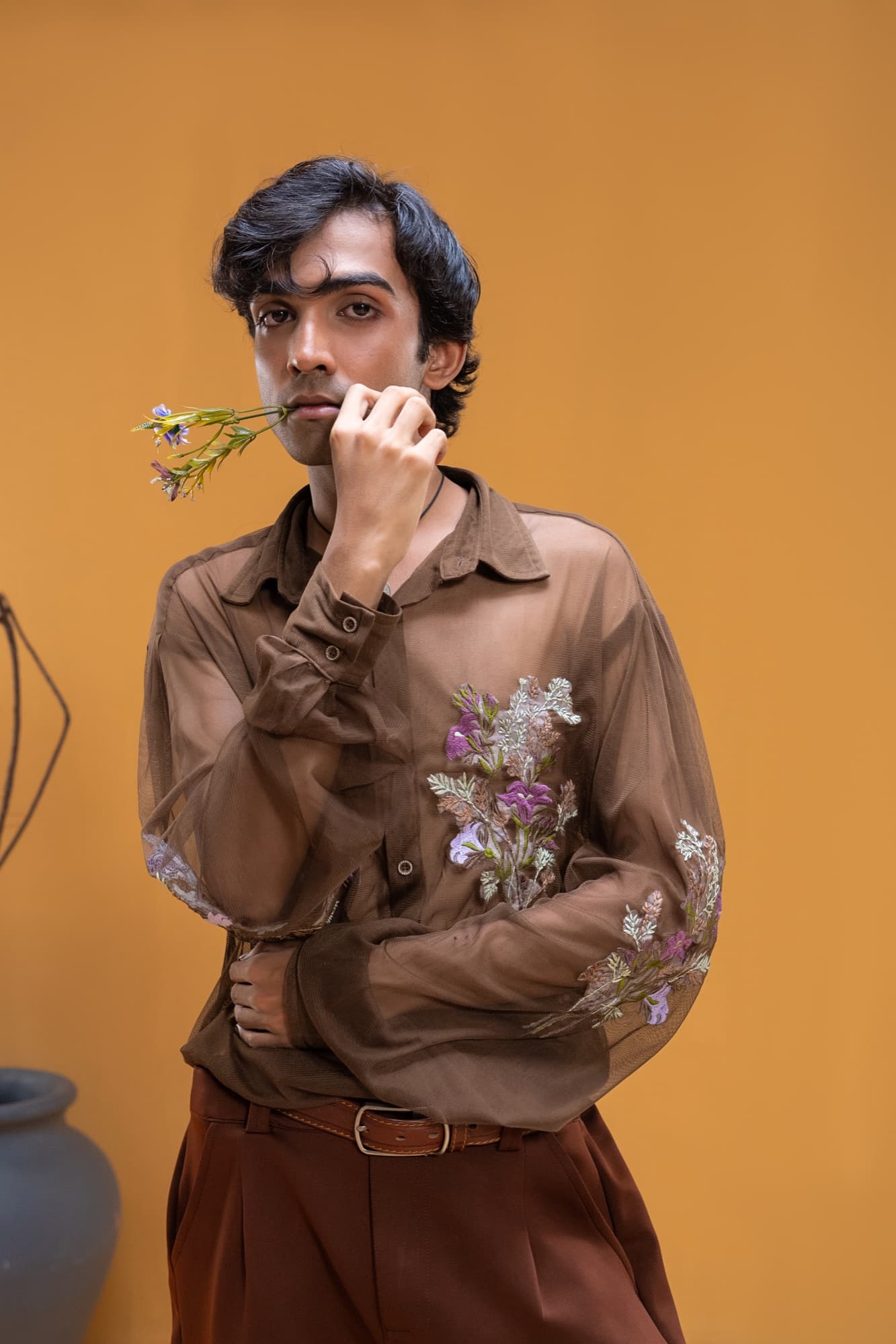 Petal Remains BUFT Graduation Couture Collection 2026 by Bangladeshi fashion designer Narin Juhi — layered organza in dusty rose, violet, cocoa and ivory with ruffles and dried-flower embroidery, photo 9 of 36