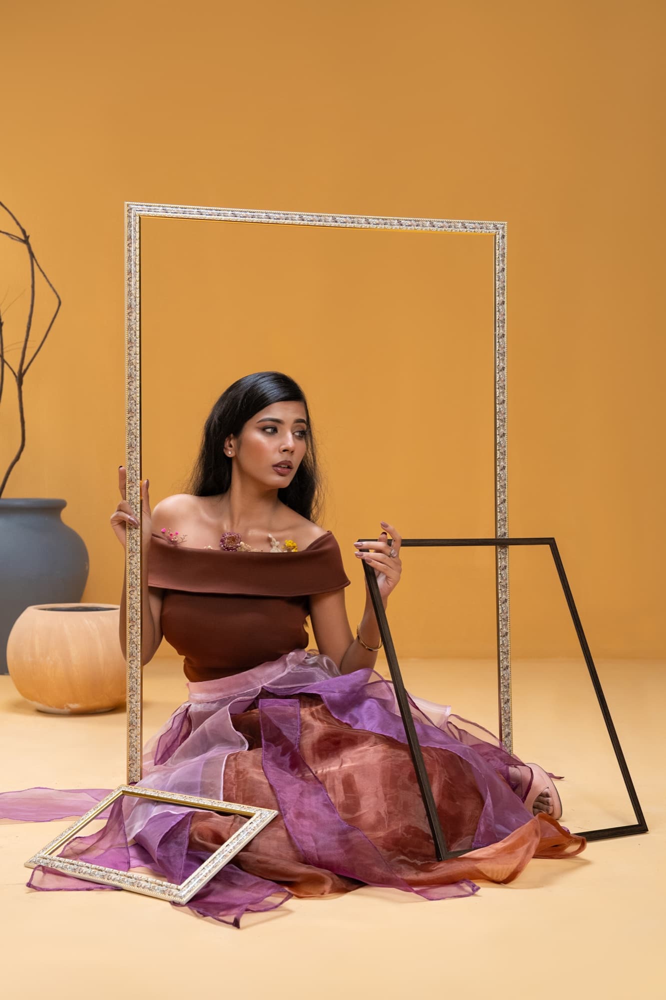 Petal Remains BUFT Graduation Couture Collection 2026 by Bangladeshi fashion designer Narin Juhi — layered organza in dusty rose, violet, cocoa and ivory with ruffles and dried-flower embroidery, photo 7 of 36