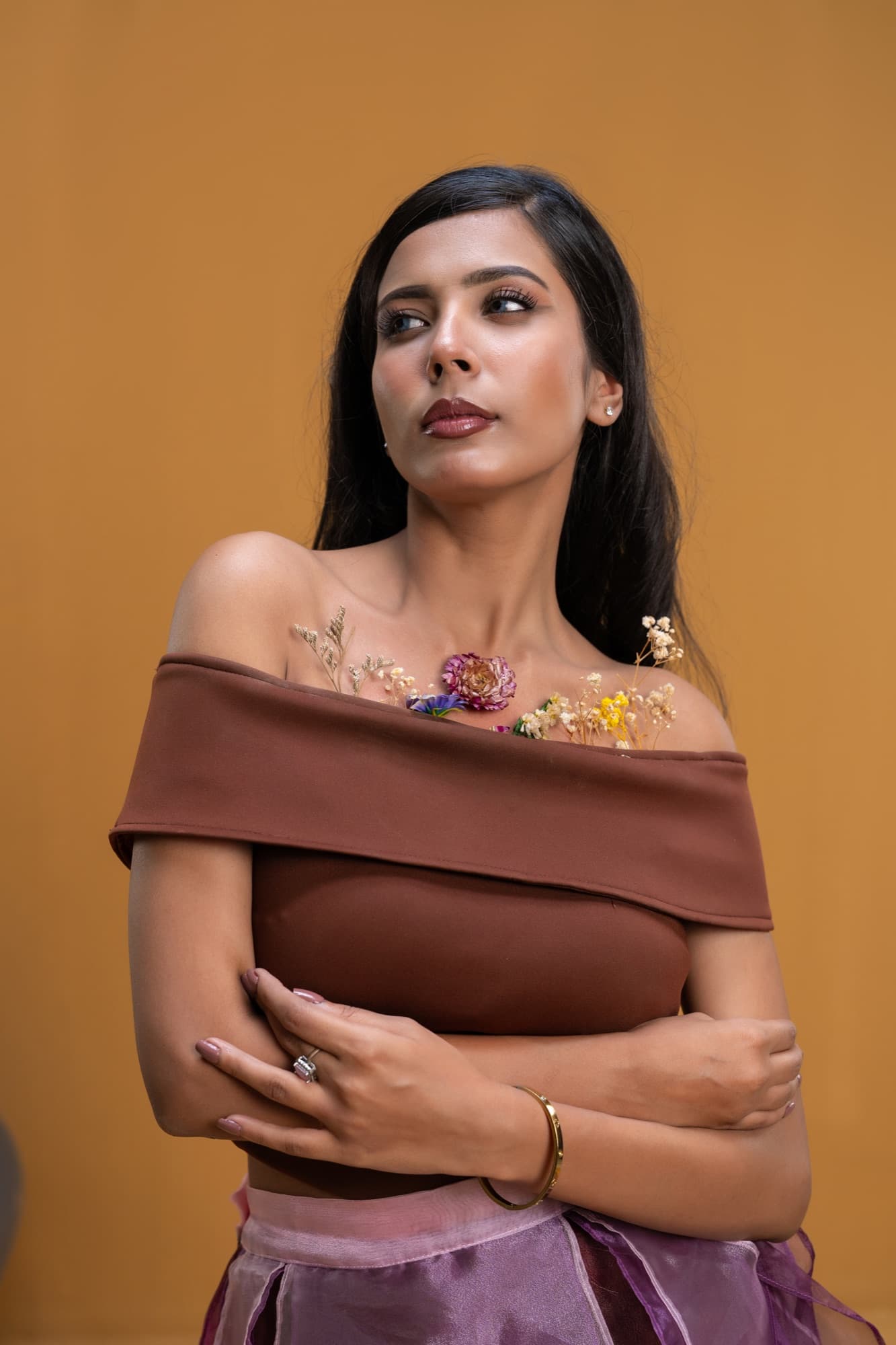 Petal Remains BUFT Graduation Couture Collection 2026 by Bangladeshi fashion designer Narin Juhi — layered organza in dusty rose, violet, cocoa and ivory with ruffles and dried-flower embroidery, photo 2 of 36
